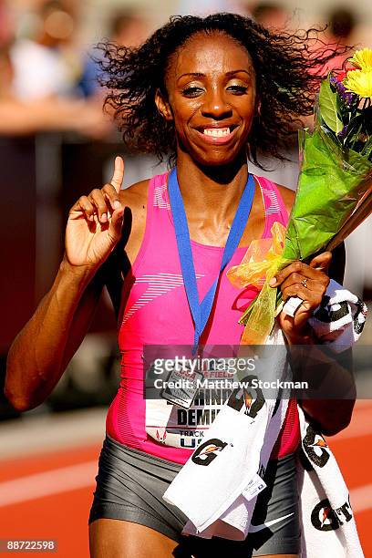 Lashinda Demus celebrates winning the 400 meter hurdles during the USA Outdoor Track & Field Championships at Hayward Field on June 27, 2009 in...