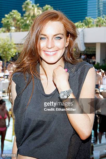 Actress Lindsay Lohan appears at the Wet Republic pool at the MGM Grand Hotel/Casino as she celebrates her birthday and her Sevin Nyne brand tanning...