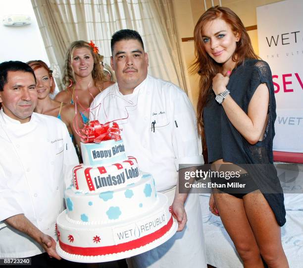 Actress Lindsay Lohan is presented with a birthday cake as she appears at the Wet Republic pool at the MGM Grand Hotel/Casino to celebrate her...