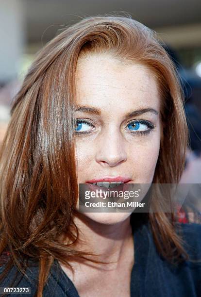 Actress Lindsay Lohan arrives at the Wet Republic pool at the MGM Grand Hotel/Casino to celebrate her birthday and her Sevin Nyne brand tanning mist...