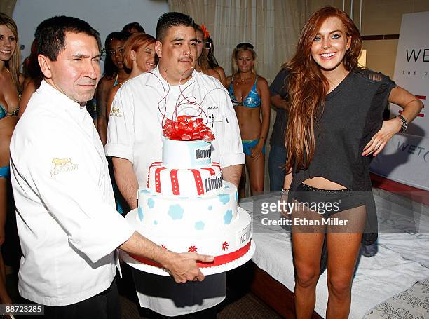 Actress Lindsay Lohan is presented with a birthday cake as she appears at the Wet Republic pool at the MGM Grand Hotel/Casino to celebrate her...