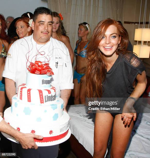 Actress Lindsay Lohan is presented with a birthday cake as she appears at the Wet Republic pool at the MGM Grand Hotel/Casino to celebrate her...