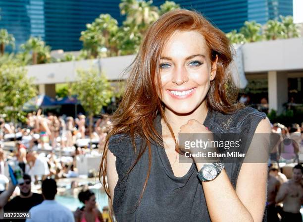 Actress Lindsay Lohan appears at the Wet Republic pool at the MGM Grand Hotel/Casino as she celebrates her birthday and her Sevin Nyne brand tanning...
