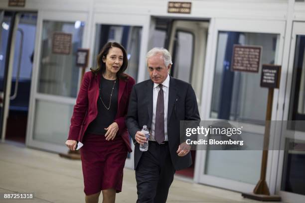 Senator Maria Cantwell, a Democrat from Washington, left, and Senator Bob Corker, a Republican from Tennessee, exit the Senate subway in the basement...