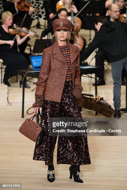 Model walks the runway during the Chanel Collection Metiers d'Art Paris Hamburg 2017/18 at the Elbphilharmonie on December 6, 2017 in Hamburg,...