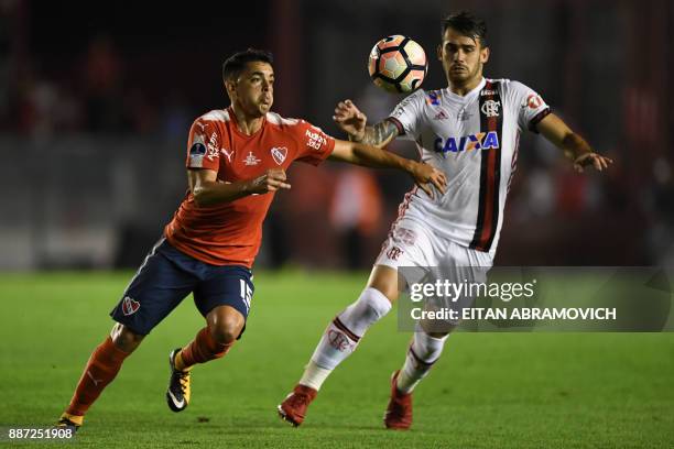 Brazil's Flamengo forward Felipe Vizeu vies for the ball with Argentina's Independiente midfielder Diego Rodriguez during the Copa Sudamericana first...