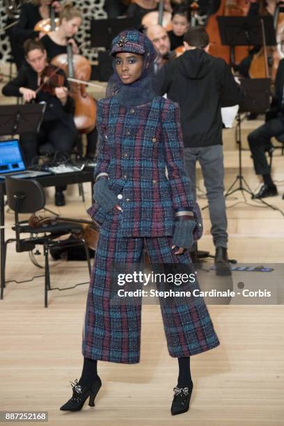 Model walks the runway during the Chanel Collection Metiers d'Art Paris Hamburg 2017/18 at the Elbphilharmonie on December 6, 2017 in Hamburg,...