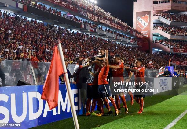 Maximiliano Meza of Indendiente celebrates with teammates after scoring the second goal of his team during the first leg of the Copa Sudamericana...