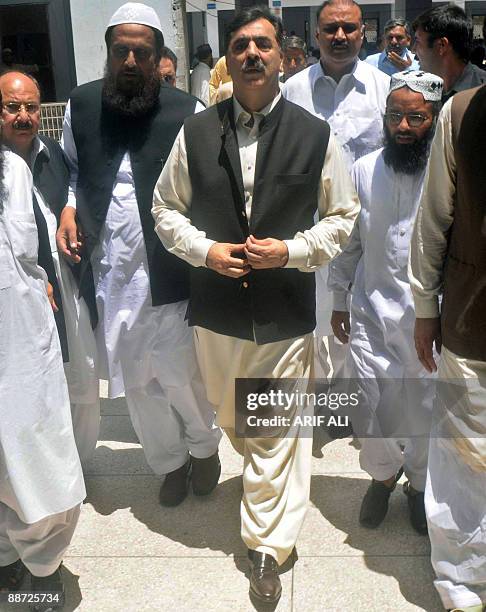 Pakistan�s Prime Minister Yousuf Raza Gilani arrives at the Jamia Naeemia, an Islamic seminary in Lahore on June 28, 2009. Religious scholar Sarfraz...