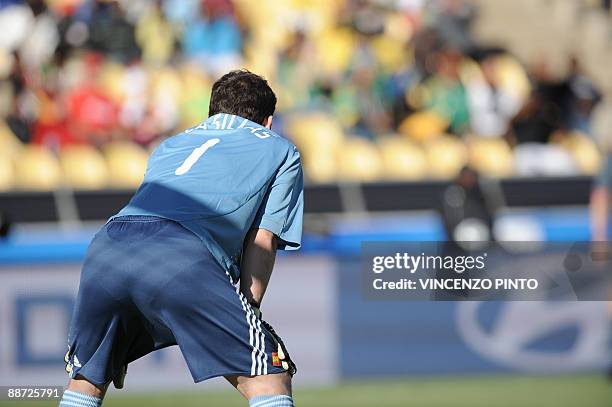 Spanish goalkeeper Iker Casillas gestures during the Fifa Confederations Cup third place play-off football match Spain against South Africa on June...