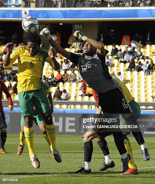 South African midfielder MacBeth Sibaya and South African goalkeeper Itumeleng Khune in action during the Fifa Confederations Cup third place...