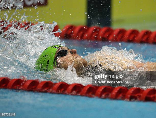 Helge Meeuw of SG Frankfurt competes in the men's 100 m backstroke A final during the German Swimming Championship 2009 at the Eurosportpark on June...