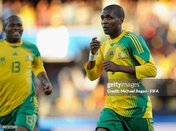 Katlego Mphela celebrates scoring the late equaliser for South Africa during the FIFA Confederations Cup 3rd Place Playoff between Spain and South...