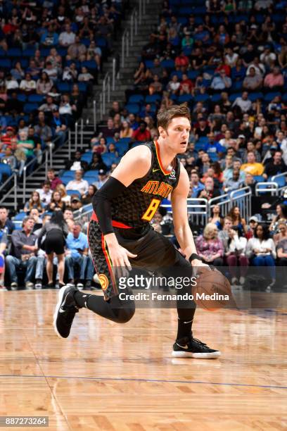 Luke Babbitt of the Atlanta Hawks handles the ball against the Orlando Magic on December 6, 2017 at Amway Center in Orlando, Florida. NOTE TO USER:...