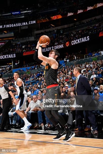 Luke Babbitt of the Atlanta Hawks shoots the ball against the Orlando Magic on December 6, 2017 at Amway Center in Orlando, Florida. NOTE TO USER:...
