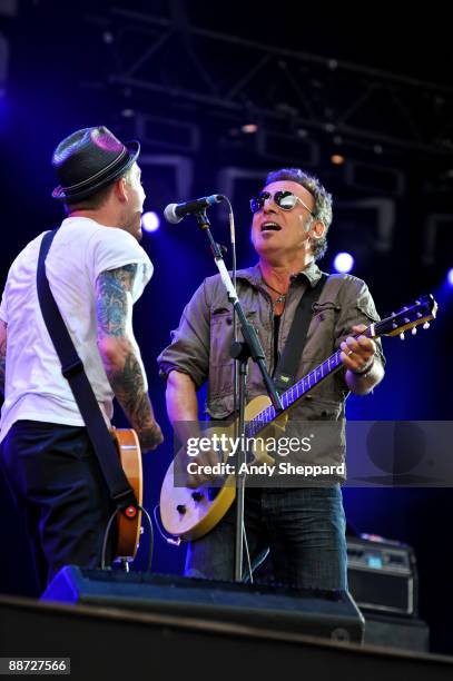 Bruce Springsteen performs on stage with Brian Fallon of The Gaslight Anthem on the last day of Hard Rock Calling 2009 in Hyde Park on June 28, 2009...