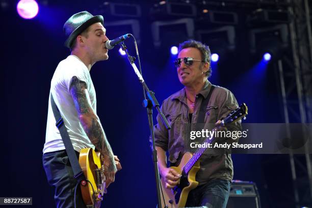 Bruce Springsteen performs on stage with Brian Fallon of The Gaslight Anthem on the last day of Hard Rock Calling 2009 in Hyde Park on June 28, 2009...