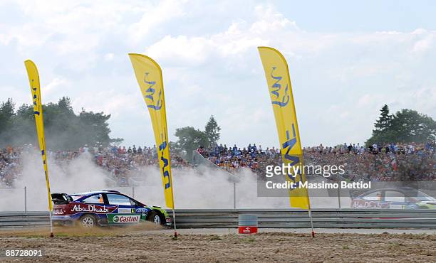 Jari Matti Latvala and Mikka Anttila of Finland crash their BP Abu Dhabi Ford Focus in to a barrier during the last stage of the third leg of the WRC...