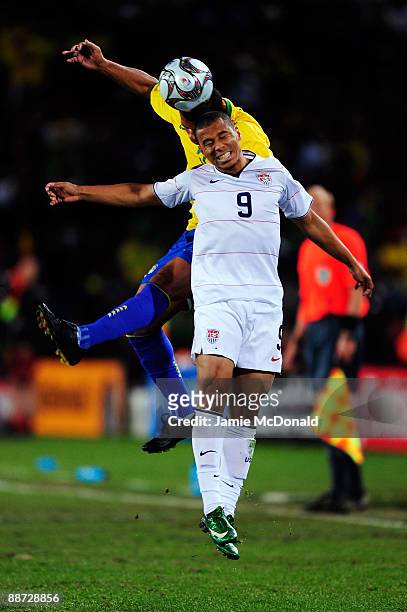 Felipe Melo of Brazil goes up for a header with Charlie Davies of USA during the FIFA Confederations Cup Final between USA and Brazil at the Ellis...