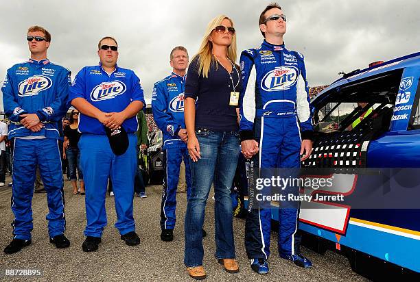 Kurt Busch , driver of the Miller Lite Dodge, and wife Eva , stand on the grid prior to the start of the NASCAR Sprint Cup Series LENOX Industrial...