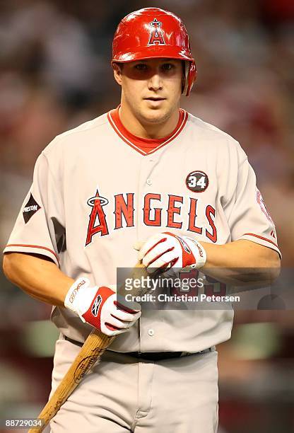 Robb Quinlan of the Los Angeles Angels of Anaheim walks back to the dugout after striking out during the major league baseball game against the...