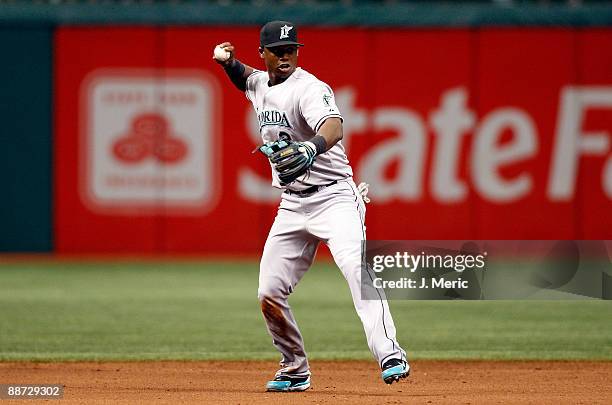 Shortstop Hanley Ramirez of the Florida Marlins throws over to first for an out against the Tampa Bay Rays during the game at Tropicana Field on June...