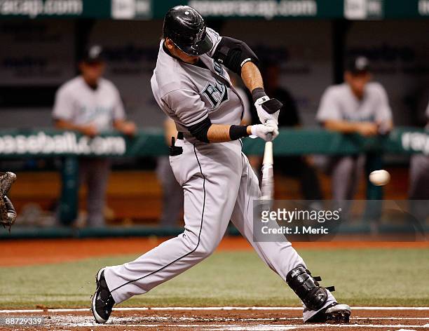 Infielder Jorge Cantu of the Florida Marlins fouls off a pitch against the Tampa Bay Rays during the game at Tropicana Field on June 28, 2009 in St....