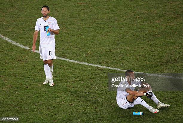Clint Dempsey and Oguchi Onyewu of USA show their dejection at the end of the FIFA Confederations Cup Final between USA and Brazil at the Ellis Park...