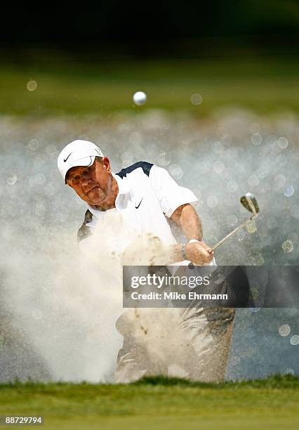 Jeff Roth hits out of the bunker on the 7th hole during the final round of The Dick's Sporting Goods Open at En-Joie Golf Club on Sunday, June 28,...