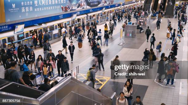 taipei, taiwan - june 27: this is a view of an mrt train in the zhongxiao fuxing downtown area on june 27, 2017 in taipei - taipei mrt stock pictures, royalty-free photos & images