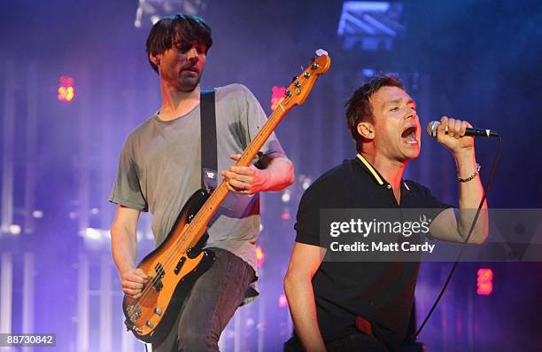 Damon Albarn and Alex James of Blur performs on the main Pyramid Stage at the Glastonbury Festival at Worthy Farm, Pilton on June 28, 2009 near...