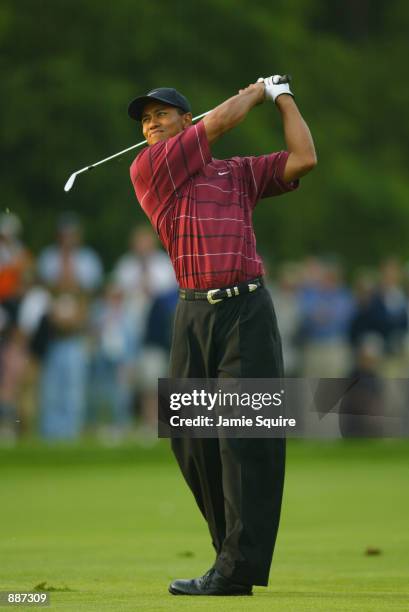 Tiger Woods hits a shot during the final round of the 102nd US Open on the Black Course at Bethpage State Park in Farmingdale, New York on June 16,...