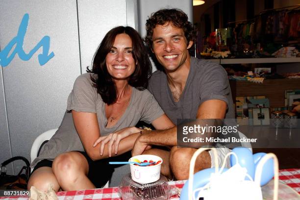 Host/actor James Marsden and wife Lisa Linde enjoy Yogen Fruz during the EB Medical Research Foundation picnic hosted by Courteney Cox and James...