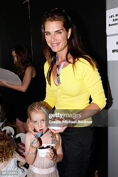 Actress Brooke Shields and daughter Rowan Henchy enjoy Yogen Fruz during the EB Medical Research Foundation picnic presented by Sinupret for Kids and...