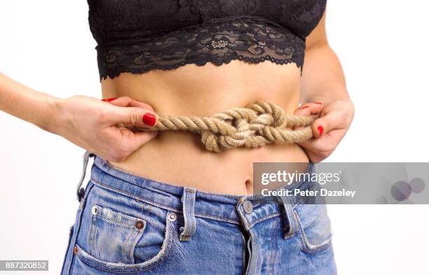 knot in stomach - irritable bowel syndrome stock pictures, royalty-free photos & images