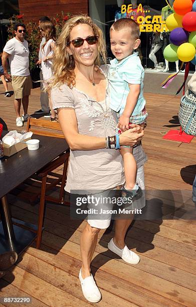 Musician Sheryl Crow and son Wyatt Steven Crow attend the EB Medical Research Foundation picnic presented by Sinupret for Kids and Yogen Fruz held at...