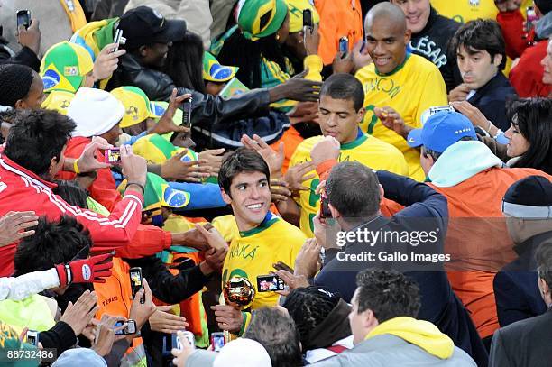 Kaka of Brazil with his teammates greet supporters after collecting their medals during the 2009 Confederations Cup final match between Brazil and...