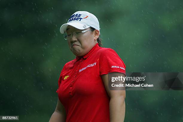 Jiyai Shin of South Korea reacts to her drive on the 17th hole during the final round of the Wegmans LPGA at Locust Hill Country Club held on June...