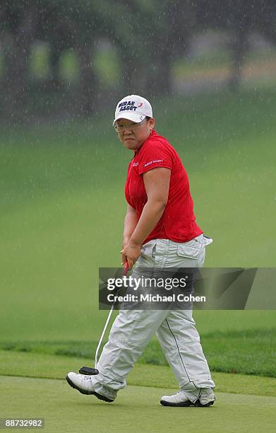 Jiyai Shin of South Korea reacts to her first putt on the 18th green during the final round of the Wegmans LPGA at Locust Hill Country Club held on...