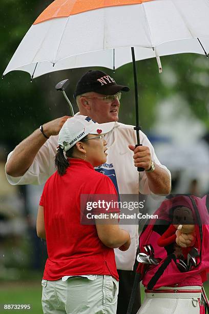 Jiyai Shin of South Korea prepares to hit her third shot on the 17th hole during the final round of the Wegmans LPGA at Locust Hill Country Club held...