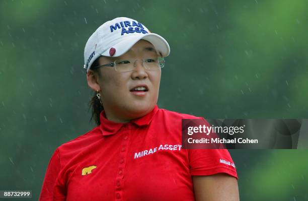 Jiyai Shin of South Korea reacts to her drive on the 17th hole during the final round of the Wegmans LPGA at Locust Hill Country Club held on June...
