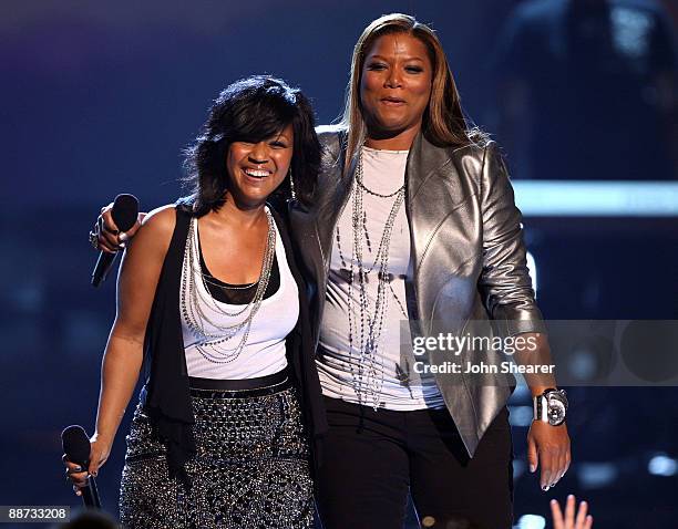 Musicians Erica Campbell of Mary Mary and Queen Latifah onstage at the 2009 BET Awards at the Shrine Auditorium on June 28, 2009 in Los Angeles,...