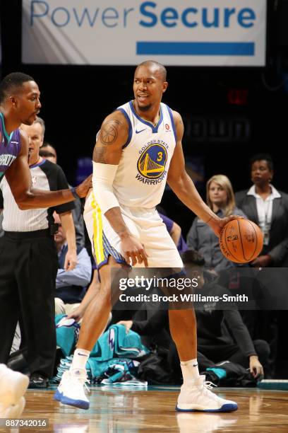 David West of the Golden State Warriors handles the ball against the Charlotte Hornets on December 6, 2017 at Spectrum Center in Charlotte, North...