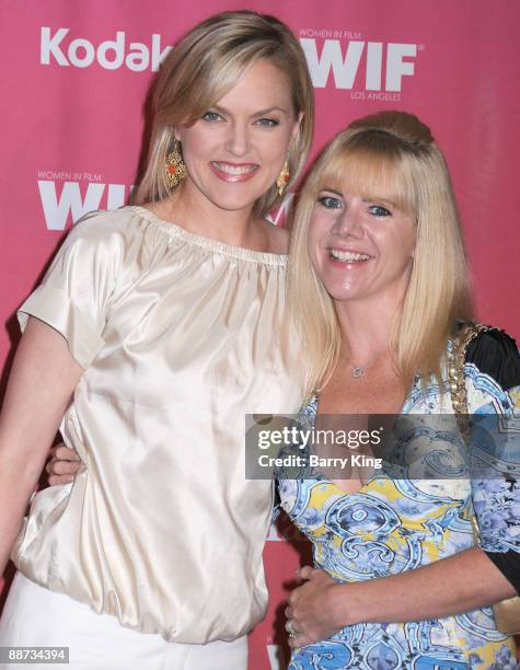 Actresses Elaine Hendrix and Jennifer Elise Cox arrive at the 2009 Women in Film Crystal + Lucy Awards at Hyatt Regency Century Plaza Hotel on June...