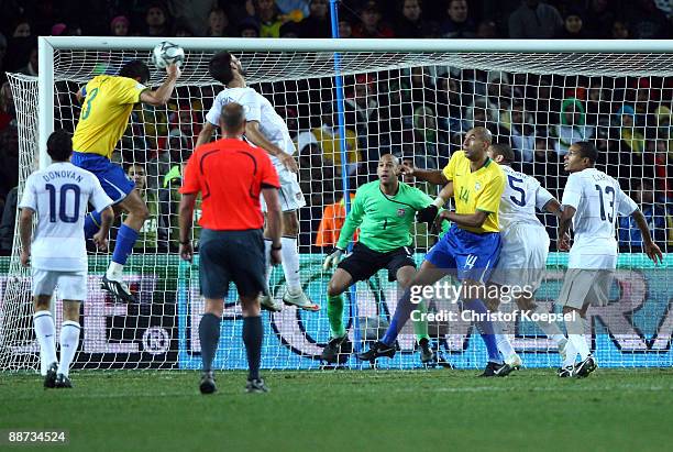 Lucio of Brazil scores the decision goal during the FIFA Confederations Cup Final between USA and Brazil at the Ellis Park Stadium on June 28, 2009...