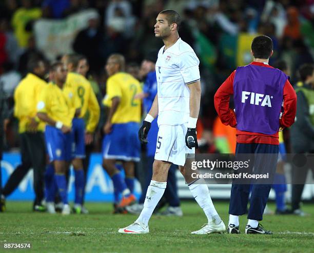 Oguchi Onyewu of the USA shows his dejection at the end of the FIFA Confederations Cup Final between USA and Brazil at the Ellis Park Stadium on June...