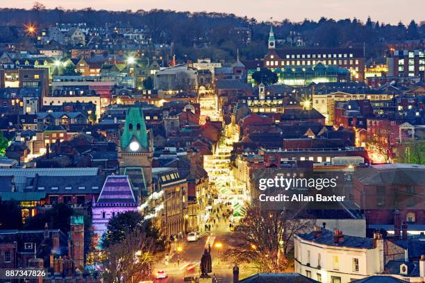 aerial view of winchester illuminated at dusk - winchester england stock pictures, royalty-free photos & images