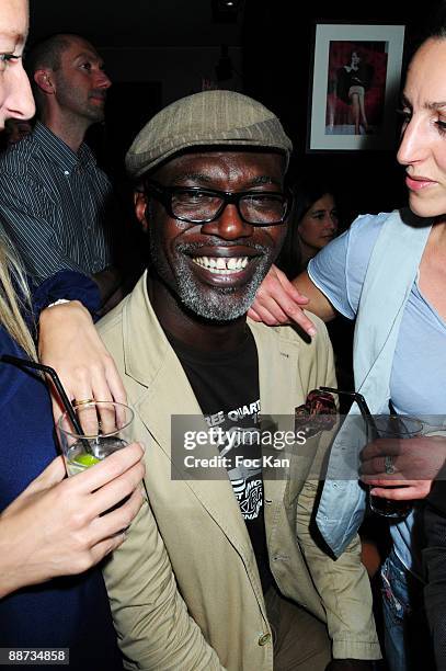 Actor Eriq Ebouaney and some guests attend the Marie Amelie Seigner Concert Party at the Cha Cha Club on June 17, 2009 in Paris, France.