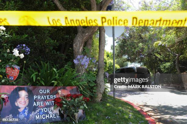 Vehicle leaves the rented Holmby Hills home of music legend Michael Jackson after his recent death, in Los Angeles on June 27, 2009. The family of...