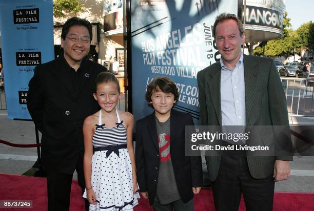 Koji Hoshino and Steve Alpert of Studio Ghibli pose with actors Noah Cyrus and Frankie Jonas and Ghibli's attend the 2009 Los Angeles Film Festival's...